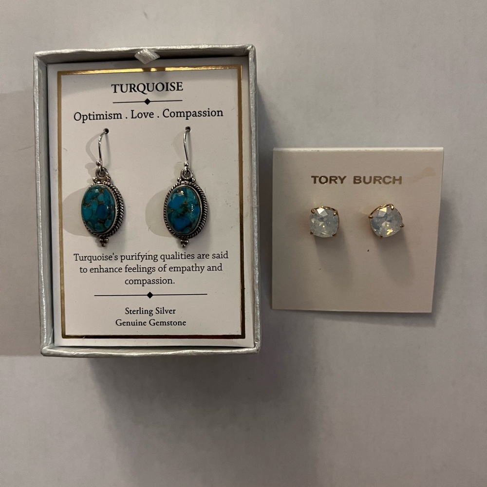Two earrings: Turquoise dangly earrings and a bold pair of Tory Burch studs!